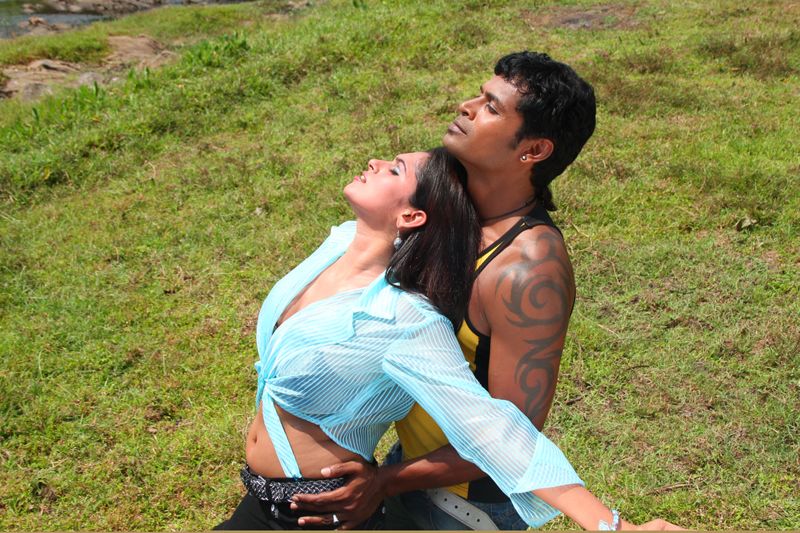 Sowdharya Movie Stills Gallery cleavage