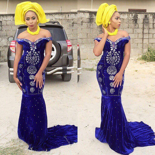 Creative Aso Ebi Styles For Wedding Paired With Yellow Gele