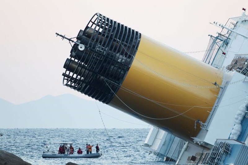 Italian Cruise Ship Costa Concordia Topples at Shore