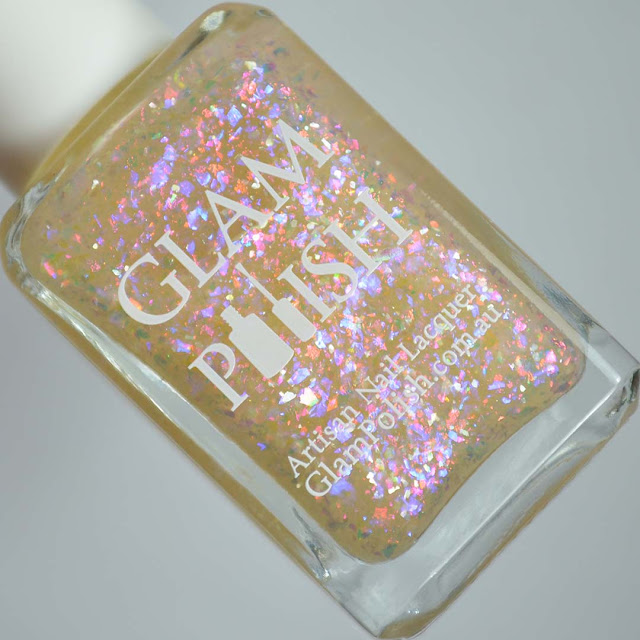 rainbow flakie nail polish in a bottle