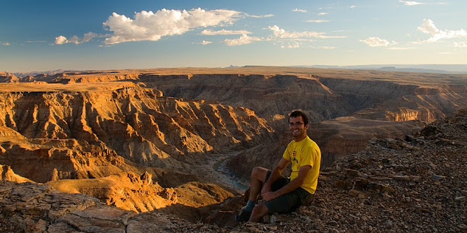 Sitting on the edge of Fish River Canyon, Namibia