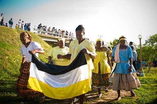 Parade lead by Garifuna women; Banquitas, Orange Walk Town.