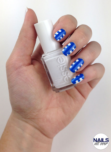 Used: Essence Studio Nails 24/7 Nail Base -  Essie "Blanc" -  P2 Color Victim "All About Blue" -  Seche Vite Dry Fast Top Coat -  Dotting Tool