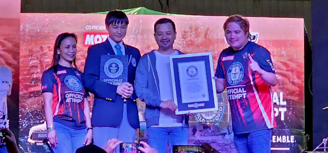 [1] Subic Bay Metropolitan Authority (SBMA) Chairman and Administrator Jonathan D. Tan joins Ford Everest Club Philippines (FECP) officers as they receive the Certificate of Award from the adjudicator of the Guinness World Records at the Subic Bay International Airport (SBIA).
