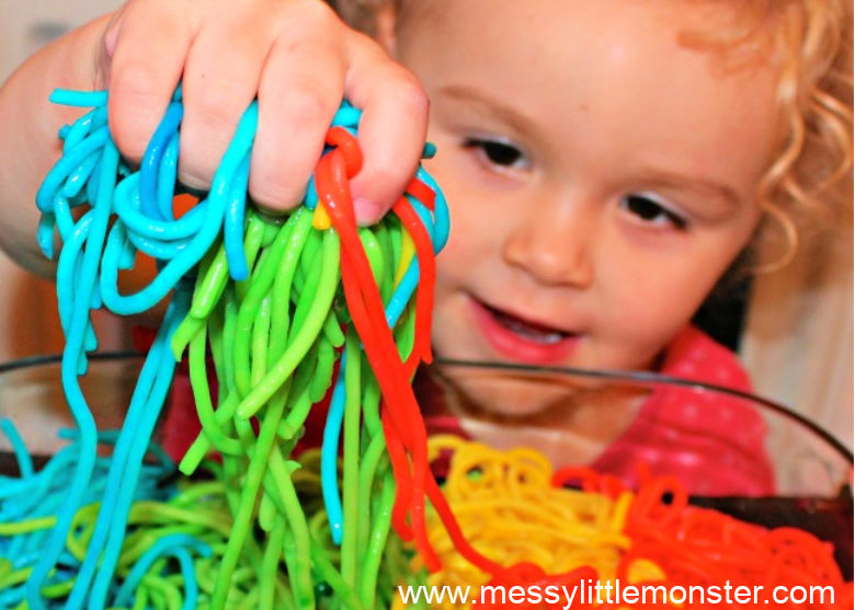 Rainbow spaghetti sensory bin