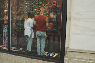 Washington DC Oct 80, 2016 couple arrange how stores window will  look