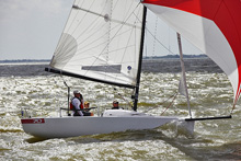 J/70 one-design sailboat- sailing fast on Galveston Bay, Houston, Tx