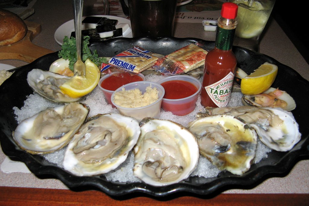  with a shellfish platter of 6 icy clams and 6 oysters on the half shell.