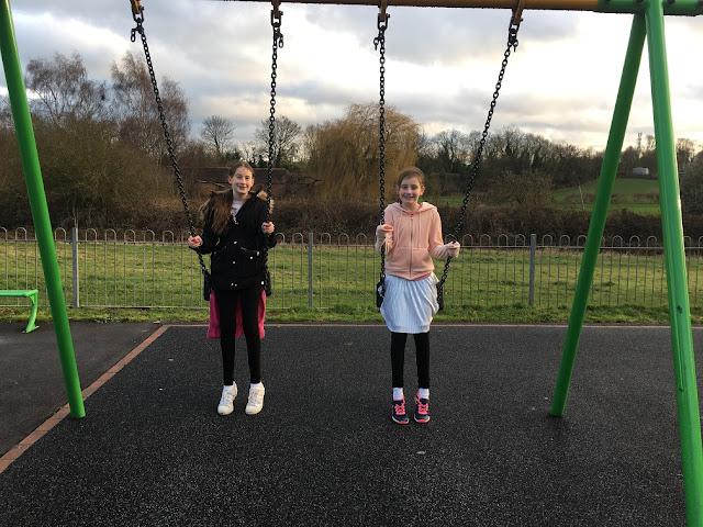 stephs two girls on swings