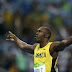 Bolt stays on track for historic treble-treble with 200m win