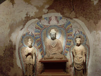 Painted Sculpture of Buddha with two Bodhisattvas c618AD