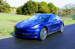 Tesla Model 3 front three quarters (Credit: Tesla) Click to Enlarge.