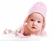 Cute baby in a pink cap. Cute baby in a pink cap. Cute laughing baby.