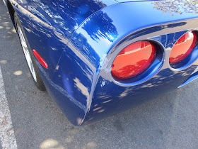 Scrapes on bumper of 2004 Chevrolet Corvette.