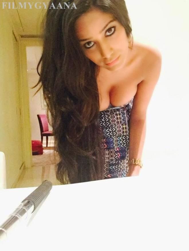 Most Beautiful Poonam Pandey's Hot Unseen Selfies Exposing Her Huge big Cleavage in tight mini skirt