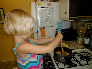 Aria making mac n cheese