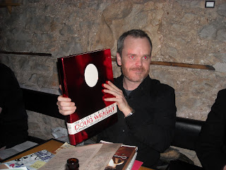 brad mackay poses with doug wright book