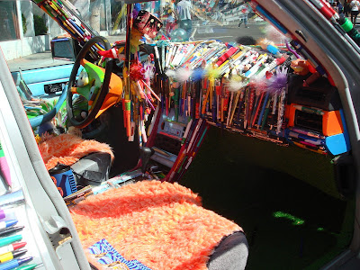 Inside the Mercedes Pens with new orange fuzzy seat covers