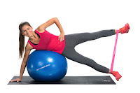 Lying abductor lift with an exercise ball and a mini resistance band