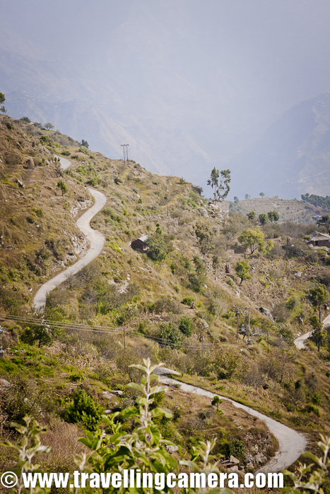 On 5th day of MTB Himchal, health of our car was not good. After having proper checkup and servicing, we moved from Baghipul towards Bahu which was camping site on 5th day !!! Let's continue with next PHOTO JOURNEY of 5th day of MTB Himachal 2011 - Somehow it was boring day for us... Nothing very scenic and bored of clicking similar shots all through... And our car had to broke down on same day... On top of that it's difficult to handle officials who start giving their expert fundas on 'how to click photographs and where' ... I hope someone read it and try to learn :) ... I was amazed to listen one of the official suggesting an angel on which a media-person should shoot. Creative people also accept new ideas but the tone should be friendly :)Anyway all this happen although MTB team is unique in itself :) ... Many photographers/media folks in Delhi and Shimla are very well aware of that fact :) ... Recently I met few folks in Delhi Photo Festival who were contacted for photography and got to know about some amazing stuff which could not be shared on this blog :)Anyway, all the riders kept riding during free-ride and were not able to locate starting to Stage-2 :) ... Suddenly they realized that free ride of 12 kilometers is over and now they should have been able to reach the starting point of Stage-2.ere most of the riders from Nepal and Army are waiting for Officials to come and decide where is Stage-2. Usually assigned folks move ahead and mark the area from where a stage had to start. This time, there was some confusion and no one reached the place. Since there was no marking, riders kept riding assuming that it's free-ride and went ahead. All of these riders were really irritated and one of them called the officials to check the status. No one had any clue, which was strange that no one in main organizing team knew about the stage-2 of India's toughest mountain terrain biking !!!Anyway, action was taken after that call and it took 30 minutes for them to reach the point, which was lot of time by considering schedule of a day. After all this mismanagement, stage-2 of day-5 started...Suddenly we realized that roads were moving upwards and weather was changing. Although he could not decide weather camp is at height or there is again a downhill after this uphill, which was usual thing to happen everyday. Steep uphill and a sudden downhill to end the day ...Bike Marshals moving ahead and their bike flying in air !!!This particular stretch was a bit interesting as from top we were able to see multiple layers of road coming up... This was something that was different from other places. But lighting was not very favorable and mist made the things more difficult. Evening was hazy on 5th day of MTB Himachal 2011..A defocused photograph, but can give an idea about the deepness of this valley... and this was stage-2 of MTB Himachal 2011 !!Stage-2 was mainly like --- It had start with downhill tarmac and then this uphill... Then we crossed Village Urtu.. After Urtu Kachha road started and after Bandal village, downhill started... And then again tarmac & kachha after few miles...Today we had request Ajay Padit Chettri to show some stunts when see us shooting him :) ... And each time we showed us new stunts.. Here only one tyre in air .. On finish of last stage on final day, both of the tyres of his bike were in air and photograph will be shared in same sequence...Suddenly all the riders came into action when it started getting dark and downhill was last phase of this stage. Here Mr. Amitabh Pandey in action during MTB Himachal 2011 !!!It was also good time to try panning !!! Mr. Darshan was extremely happy to see this photograph and 45 minutes spent at this spot were proven worth.Another panning photograph shot during MTB Himachal 2011 !!!Rider corssing flying finish point of last stage of the day-5 during Mountain Terrain Biking 2011 !!! After Second stage, there was free ride through Durah Village and free ride ends with uphill... The Stage three was through Tandi Village, Garshai, Dathu, Seobagh, Kattar and Kandhaghai Pass...It was getting dark and next free ride of  kilometers was to finish as quick as possible. Rain was also expected during night but luckily we were safe :)