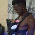 Daddy duties! Akpororo cradles his baby girl (Photo) 