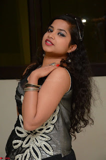 Shrisha Dasari in Sleeveless Short Black Dress At Follow Follow U Audio Launch 047.JPG