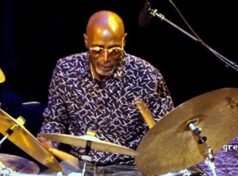 TS Monk behind drums; photo courtesy of artist