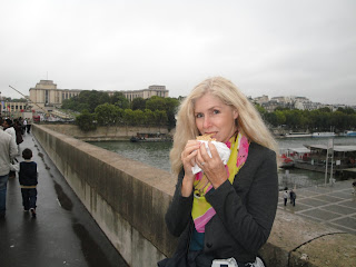 Crepe in Paris; woman eating crepe