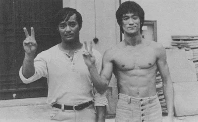 Dan Inosanto and Bruce Lee on the set of Game of Death.