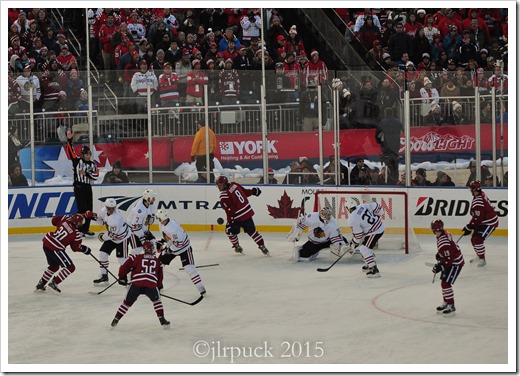 Crawford watches the puck go by