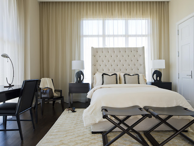 Photo of luxury bathroom with black and white furniture