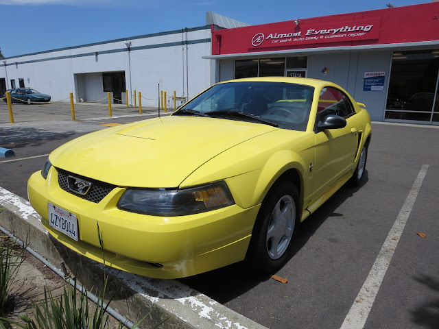 Complete car color change from yellow to black.