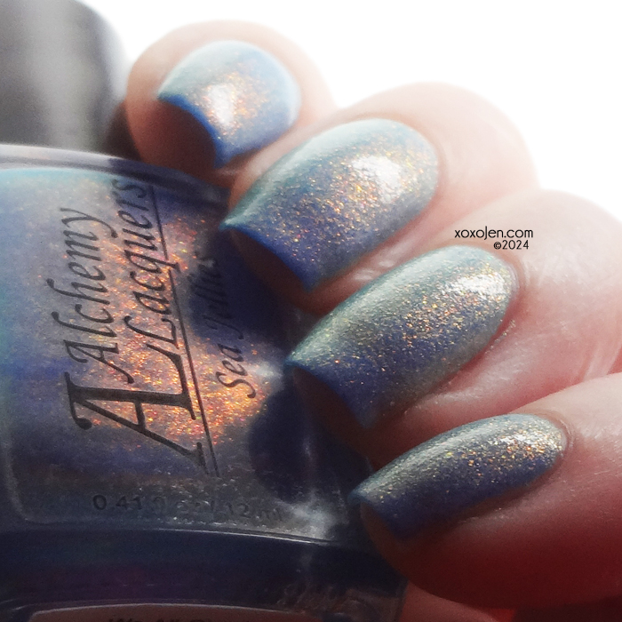 xoxoJen's swatch of Alchemy Lacquer: Sea Jellies (GITD - Limited Edition)