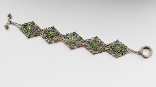 Green diamante bracelet modern pre owned