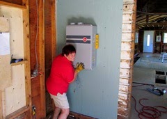 1407196 July 17 Barb Hold Tankless Water Heater On Wall