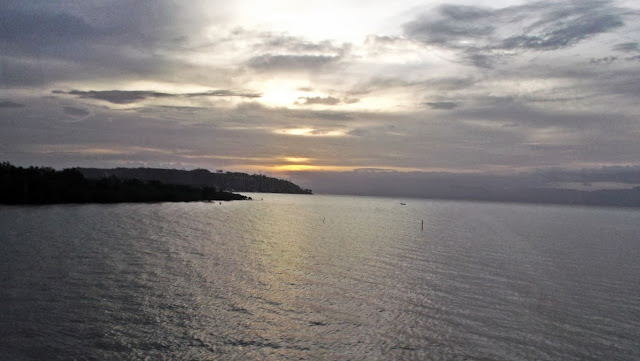 beautiful sunset sea view from the highway in southwestern cebu