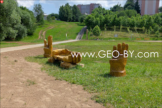 Minsk. Valley of fairy tales. Benches-palms