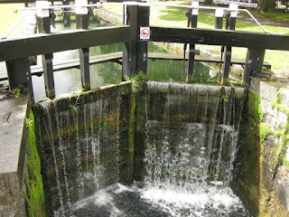 Water flowing over a lock along the Grand Canal, Dublin, Ireland