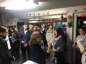 Some of this year's Food Elves gather at the Pantry for an orientation and tour