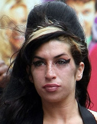 Since when does Amy Winehouse have freckles Fakery