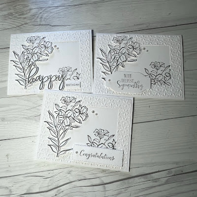 Three cards with lilies using the March 2023 Ten Years of Growth Paper Pumpkin Kit