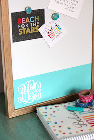 Makeover a plain memo board with spray paint and a vinyl monogram used as a reverse stencil. pitterandglink.com #monogram #Silhouette