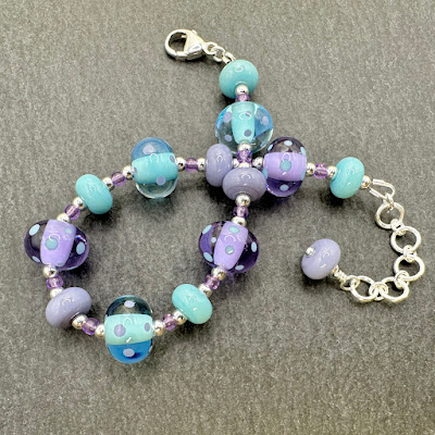 Handmade lampwork glass bead bracelet by Laura Sparling