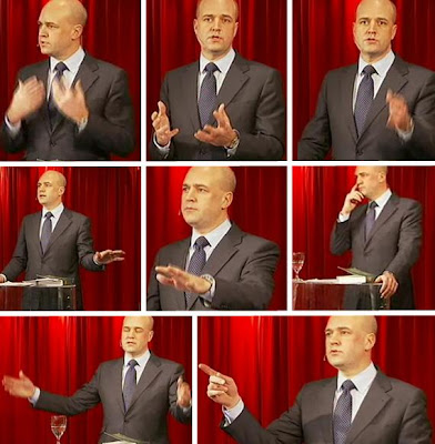 Reinfeldt gestikulerar.