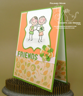 Picture of front of friendship card sitting at left angle to show dimensional elements
