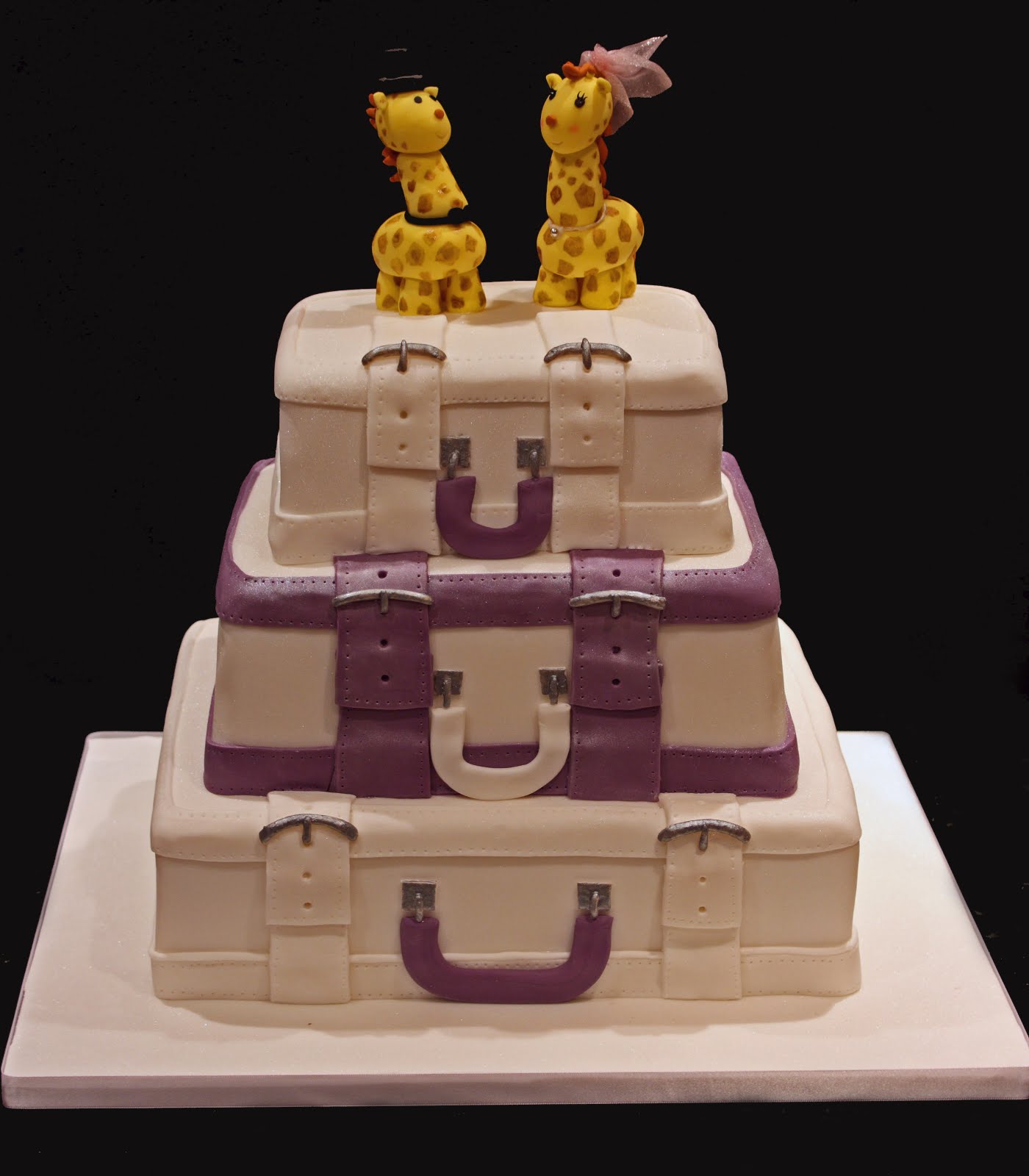 Vanilla Suitcase  cake  with purple accents