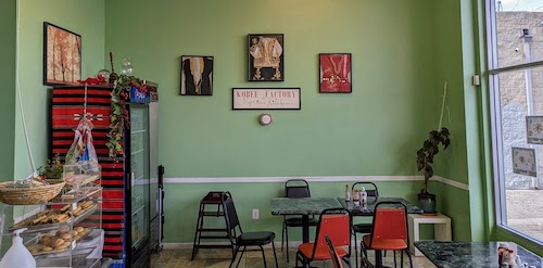 Interior of restaurant with signs and photos