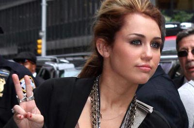 miley cyrus finger tattoos