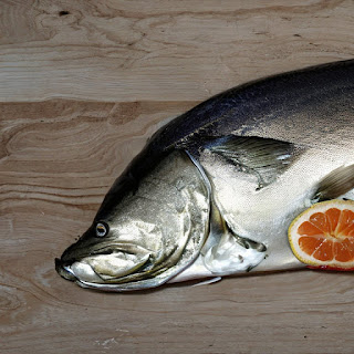 Salmon is not naturally pink; their flesh gets its pink color from a pigment called astaxanthin, which they obtain from their diet of krill and shrimp.