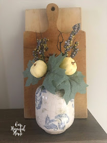 vintage inspired vase faux berry picks cutting board